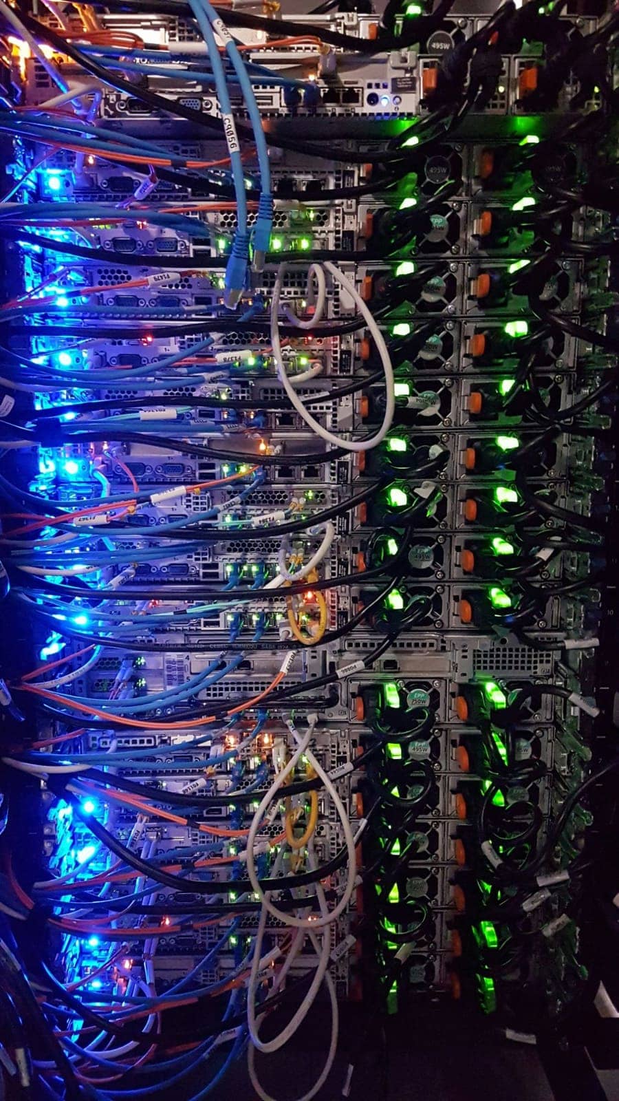 Server rack with networking cables and status lights